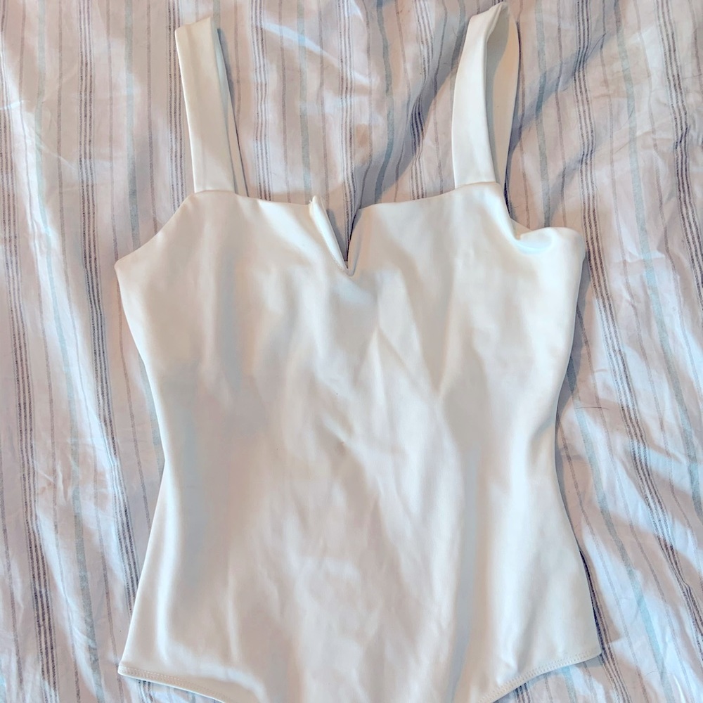 White snap bodysuit never worn